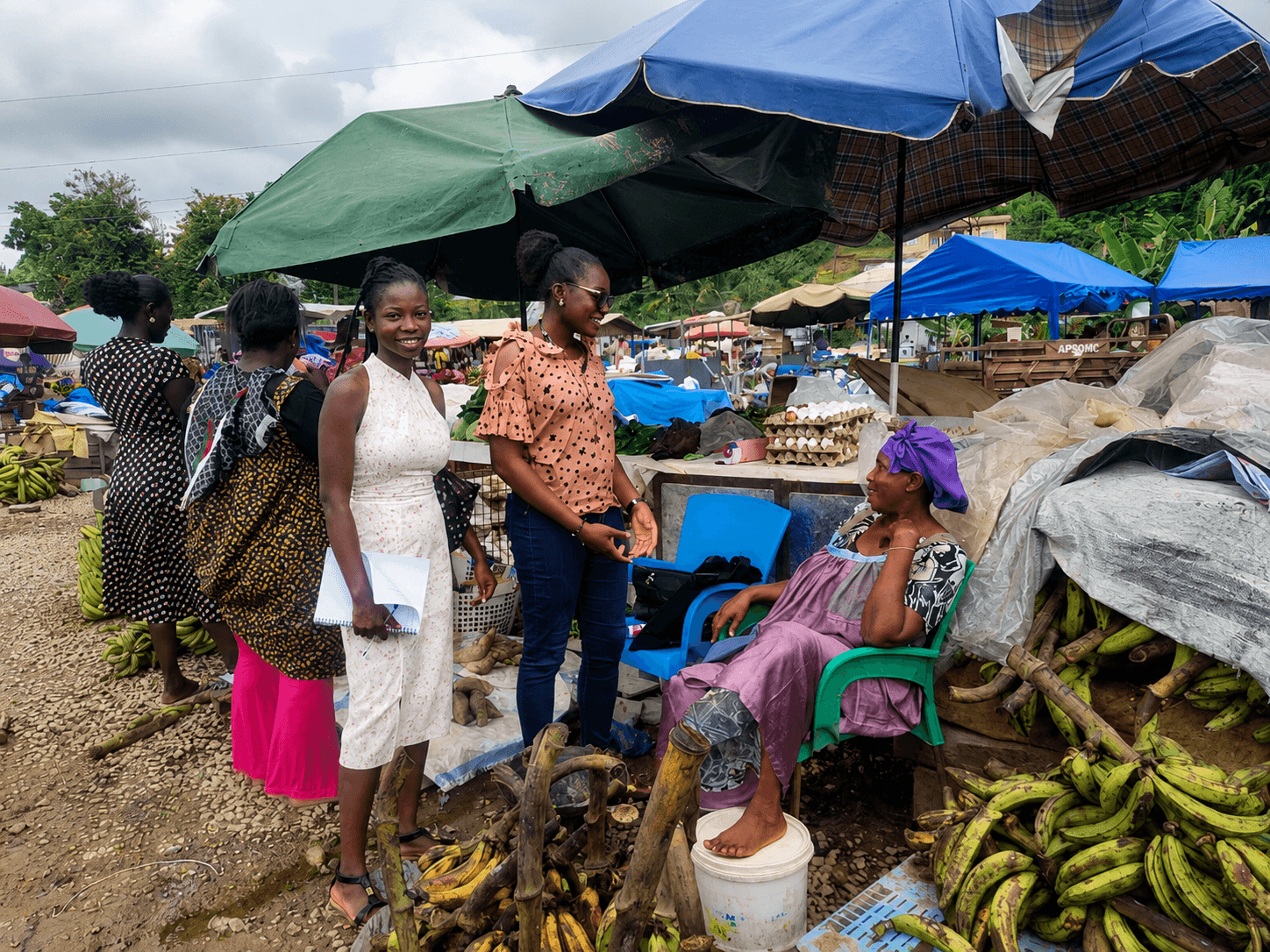 Produce vendors and operators at a Ghana market