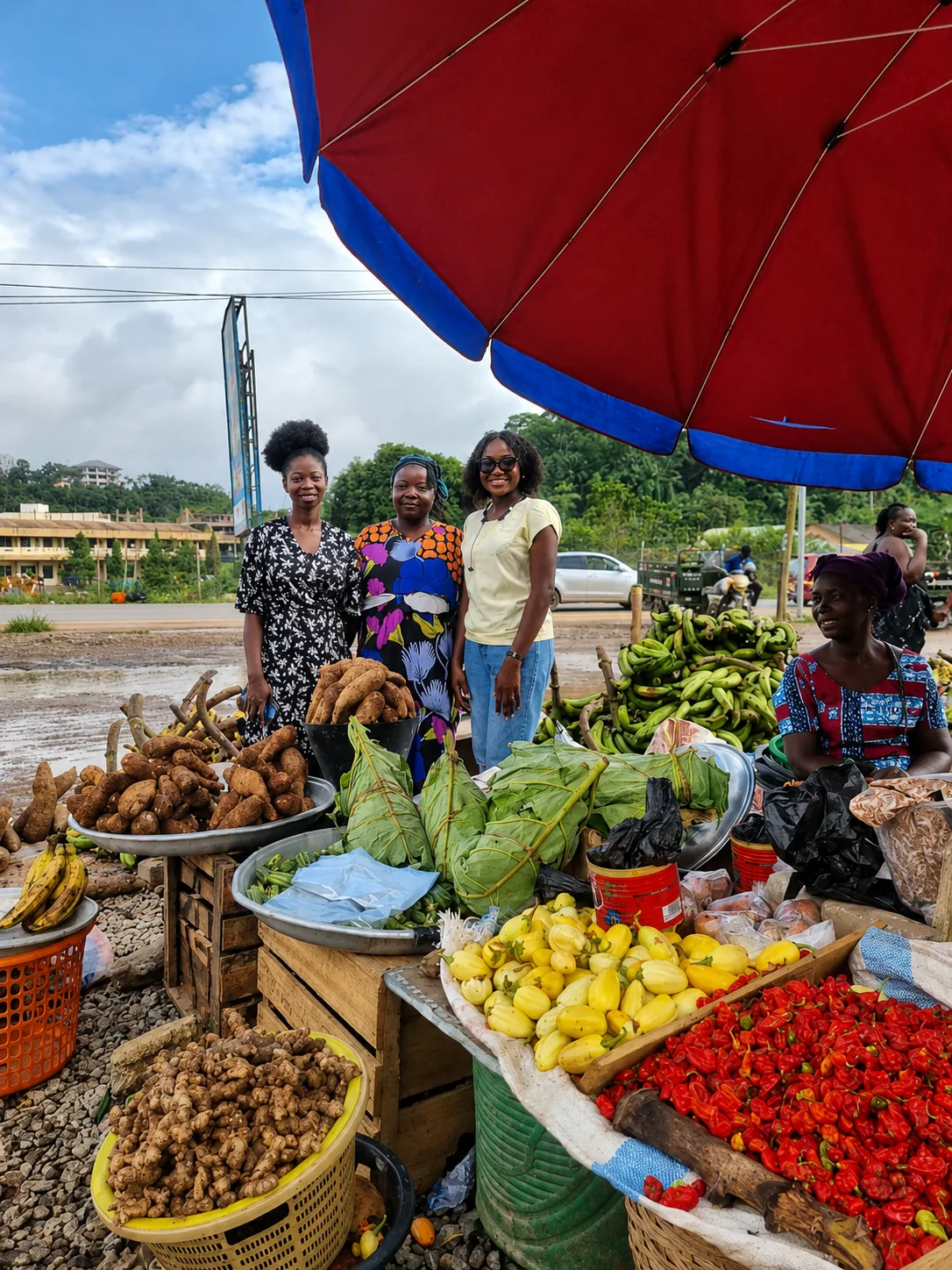 A Tarkwa produce stall displaying plantain, cassava, peppers, garden eggs, and cocoyam